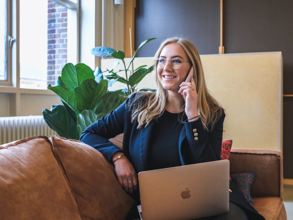 woman smiling on phone